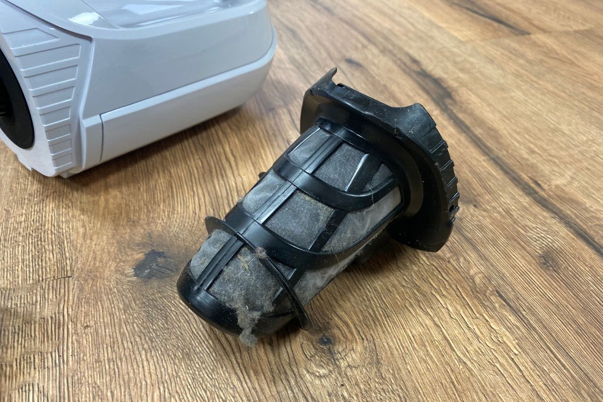 Filter van kruimeldief schoonmaken